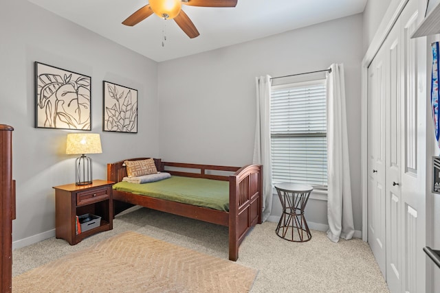 319 Key Lime Pl, Crestview, FL 32536 - carpeted bedroom with baseboards, a closet, and ceiling fan