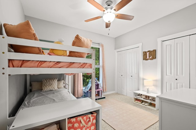 319 Key Lime Pl, Crestview, FL 32536 - carpeted bedroom featuring multiple closets, ceiling fan, and baseboards