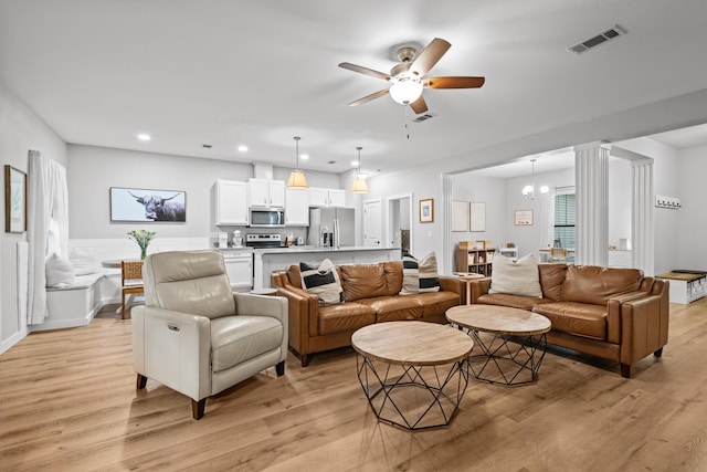 319 Key Lime Pl, Crestview, FL 32536 - living room featuring light wood-style floors, recessed lighting, and a ceiling fan
