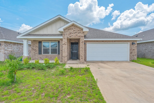 4652 Honor Guard Way, Crestview, FL 32539 - ranch-style home featuring brick siding, board and batten siding, driveway, and an attached garage