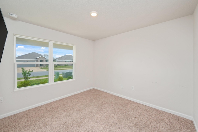4652 Honor Guard Way, Crestview, FL 32539 - spare room featuring carpet flooring and a smoke detector