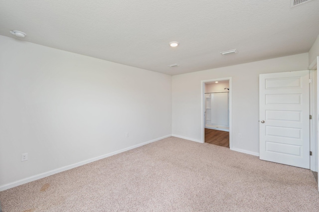 4652 Honor Guard Way, Crestview, FL 32539 - unfurnished bedroom featuring carpet floors, ensuite bathroom, and recessed lighting