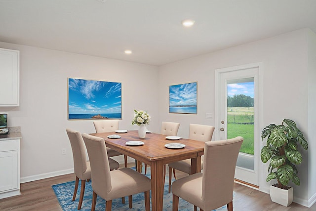 4652 Honor Guard Way, Crestview, FL 32539 - dining area with light wood-style floors and recessed lighting