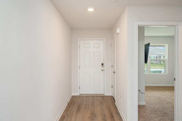 4652 Honor Guard Way, Crestview, FL 32539 - doorway with recessed lighting and wood finished floors