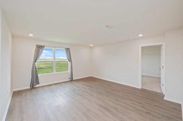 4652 Honor Guard Way, Crestview, FL 32539 - empty room featuring wood finished floors and recessed lighting