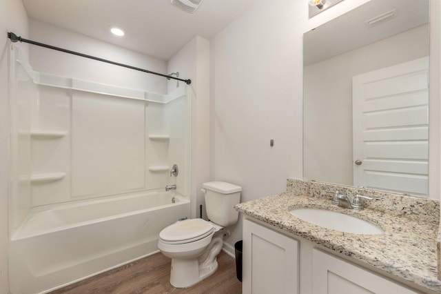 4652 Honor Guard Way, Crestview, FL 32539 - full bath with wood finished floors, vanity,  shower combination, and recessed lighting