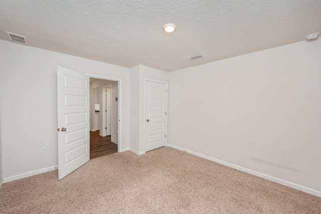 4652 Honor Guard Way, Crestview, FL 32539 - unfurnished bedroom with carpet floors and baseboards