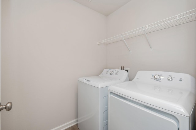 4652 Honor Guard Way, Crestview, FL 32539 - laundry area with washing machine and dryer and baseboards