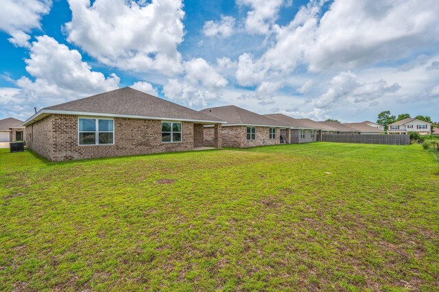 4652 Honor Guard Way, Crestview, FL 32539 - back of house featuring brick siding