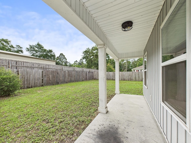 5117 Colt Dr, Crestview, FL 32539 - fenced backyard featuring a patio