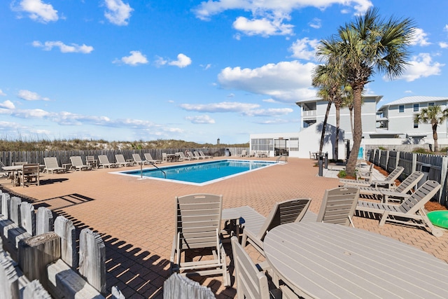 23011 Front Beach Rd Unit E-20, Panama City Beach, FL 32413 - community pool featuring a patio area