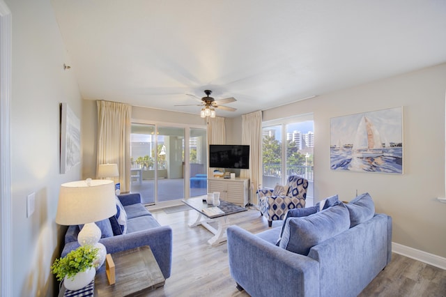 112 Seascape Blvd Unit 210, Miramar Beach, FL 32550 - living area with a ceiling fan and light wood-type flooring