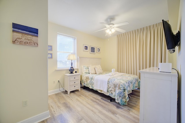 112 Seascape Blvd Unit 210, Miramar Beach, FL 32550 - bedroom with light wood-style floors and a ceiling fan