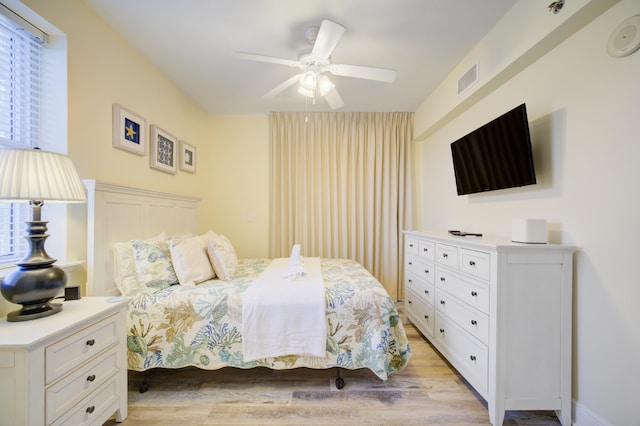 112 Seascape Blvd Unit 210, Miramar Beach, FL 32550 - bedroom with light wood-style floors and ceiling fan