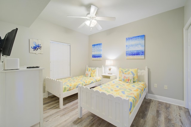 112 Seascape Blvd Unit 210, Miramar Beach, FL 32550 - bedroom with wood finished floors and ceiling fan