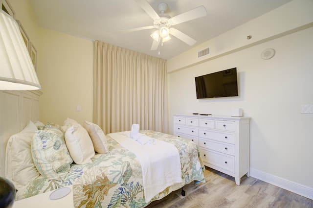 112 Seascape Blvd Unit 210, Miramar Beach, FL 32550 - bedroom with light wood-style flooring and ceiling fan