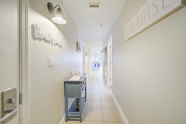 112 Seascape Blvd Unit 210, Miramar Beach, FL 32550 - hall featuring light tile patterned flooring and baseboards