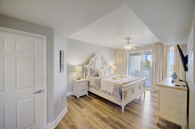 112 Seascape Blvd Unit 210, Miramar Beach, FL 32550 - bedroom featuring access to outside, light wood-type flooring, and a ceiling fan