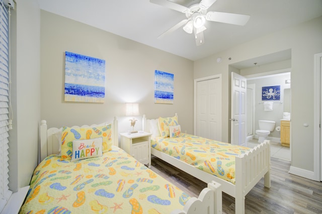 112 Seascape Blvd Unit 210, Miramar Beach, FL 32550 - bedroom with wood finished floors, a closet, connected bathroom, and a ceiling fan