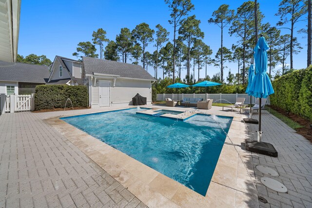 339 Pathways Dr, Inlet Beach, FL 32461 - view of pool featuring a patio, a fenced backyard, a gate, and a pool with connected hot tub