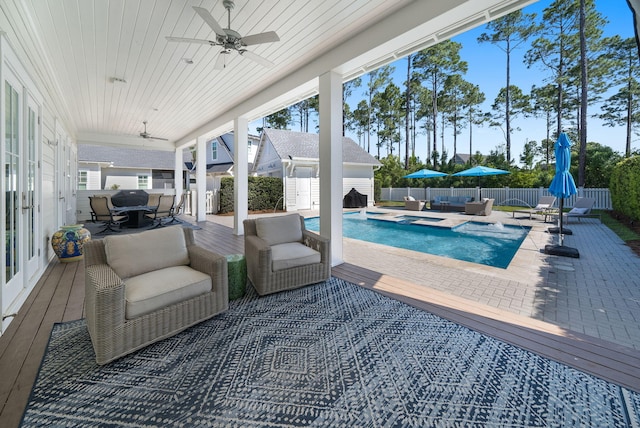 339 Pathways Dr, Inlet Beach, FL 32461 - view of swimming pool featuring ceiling fan, a fenced backyard, a patio, outdoor dining area, and a pool with connected hot tub