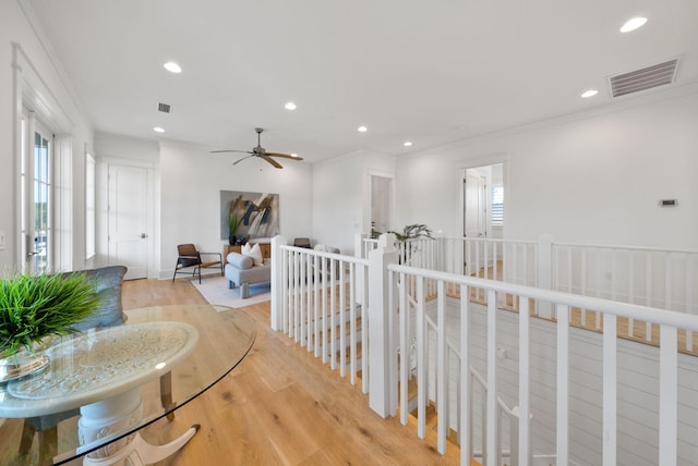 339 Pathways Dr, Inlet Beach, FL 32461 - hall with an upstairs landing, light wood-type flooring, recessed lighting, and ornamental molding