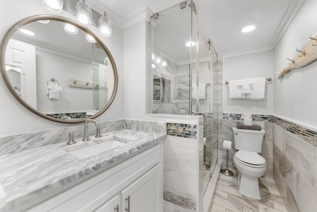 23223 Front Beach Rd # 335, Panama City Beach, FL 32413 - full bath featuring crown molding, tile walls, vanity, a stall shower, and toilet