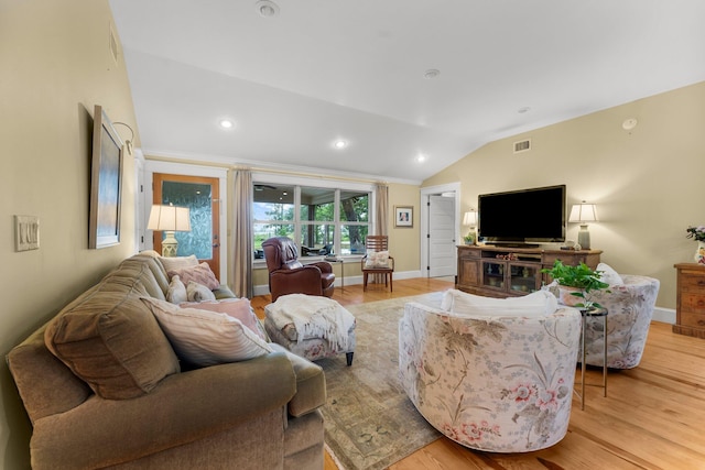 619 Pitts Bayshore Dr, Freeport, FL 32439 - living room featuring vaulted ceiling, light wood-style floors, and recessed lighting
