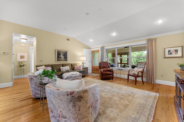 619 Pitts Bayshore Dr, Freeport, FL 32439 - living area featuring light wood-type flooring, vaulted ceiling, ornamental molding, and recessed lighting