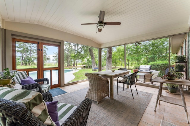 619 Pitts Bayshore Dr, Freeport, FL 32439 - sunroom featuring a ceiling fan, outdoor dining space, outdoor lounge area, and lofted ceiling