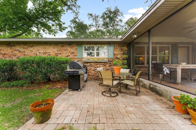 619 Pitts Bayshore Dr, Freeport, FL 32439 - view of patio / terrace featuring outdoor dining space and a grill