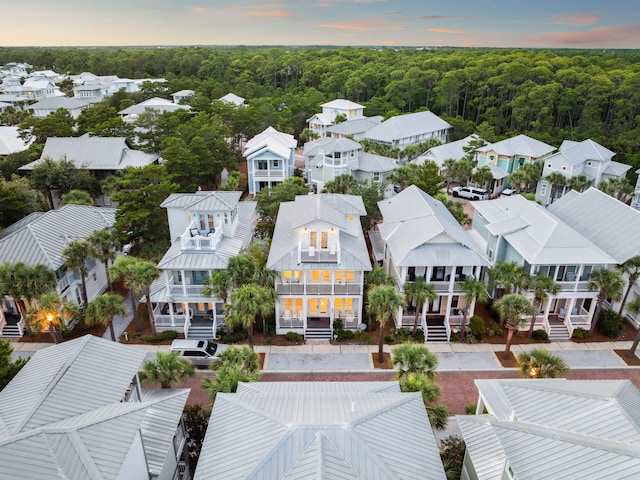 221 Seacrest Beach Blvd E, Seacrest, FL 32461 - aerial view at dusk of a residential view and a wooded view