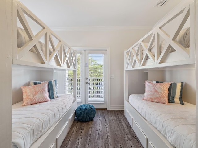 221 Seacrest Beach Blvd E, Seacrest, FL 32461 - bedroom featuring access to outside, crown molding, and wood finished floors