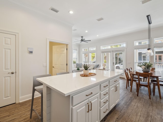 221 Seacrest Beach Blvd E, Seacrest, FL 32461 - kitchen featuring ceiling fan, a center island, white cabinetry, dark wood-style flooring, and recessed lighting