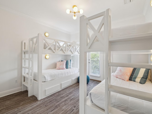 221 Seacrest Beach Blvd E, Seacrest, FL 32461 - bedroom featuring crown molding and wood finished floors
