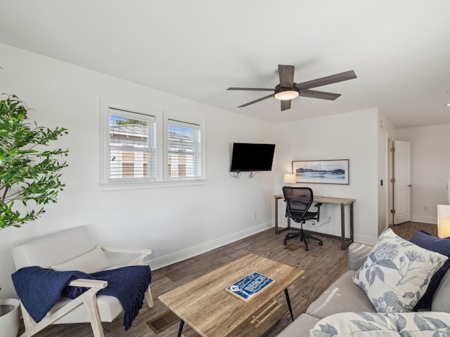 221 Seacrest Beach Blvd E, Seacrest, FL 32461 - living area featuring a ceiling fan and wood finished floors