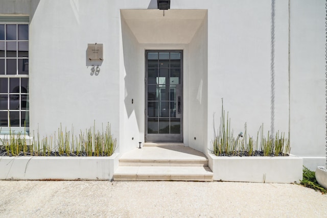 36 Caliza Ln, Inlet Beach, FL 32461 - property entrance featuring stucco siding