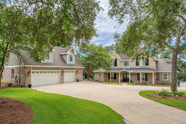 17 Poquito Rd, Shalimar, FL 32579 - view of front of property with driveway, a front lawn, a porch, roof with shingles, and brick siding