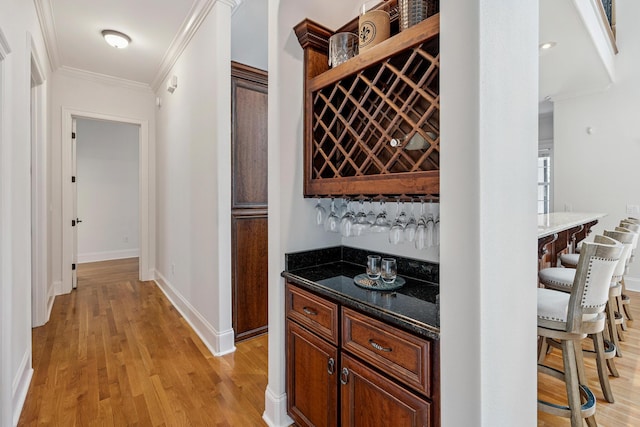 17 Poquito Rd, Shalimar, FL 32579 - indoor dry bar featuring light wood-style flooring and crown molding