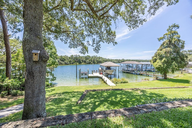 17 Poquito Rd, Shalimar, FL 32579 - dock featuring a yard, a water view, and boat lift