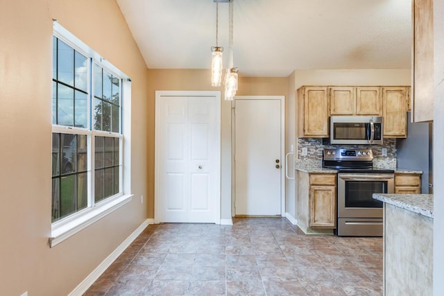 121 Trenton Ave, Crestview, FL 32539 - kitchen with stainless steel appliances, tasteful backsplash, decorative light fixtures, and light stone counters