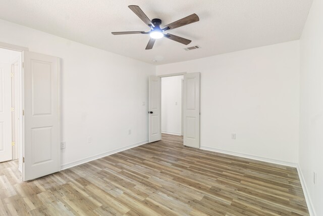 51 Yearling Ct, Defuniak Springs, FL 32433 - spare room with light wood-style floors and a ceiling fan