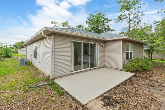 51 Yearling Ct, Defuniak Springs, FL 32433 - back of house featuring a patio and a shingled roof