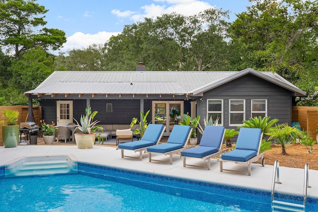 81 Canal St, Santa Rosa Beach, FL 32459 - outdoor pool featuring grilling area, a patio, and an outdoor living space