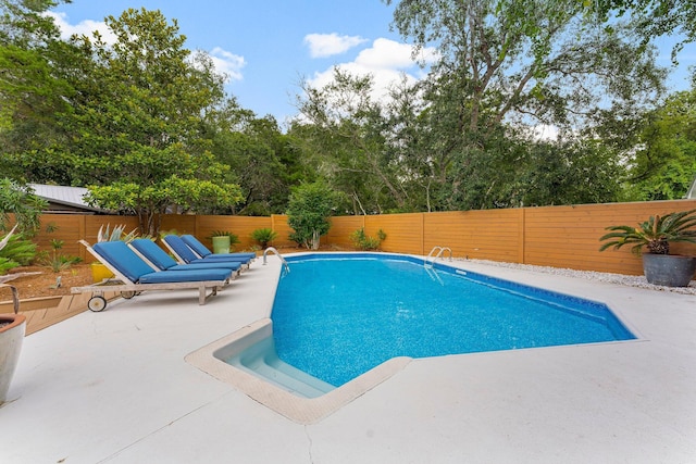 81 Canal St, Santa Rosa Beach, FL 32459 - view of swimming pool featuring a patio and a fenced backyard