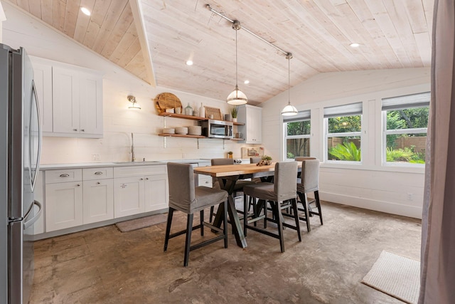 81 Canal St, Santa Rosa Beach, FL 32459 - dining area with lofted ceiling, concrete flooring, wood ceiling, and recessed lighting