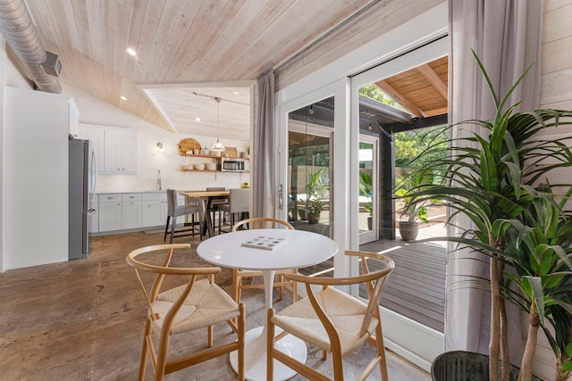 81 Canal St, Santa Rosa Beach, FL 32459 - dining room featuring wooden ceiling, lofted ceiling, and concrete flooring