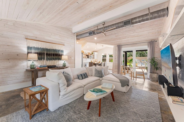 81 Canal St, Santa Rosa Beach, FL 32459 - living area featuring wooden walls, wood ceiling, and concrete floors