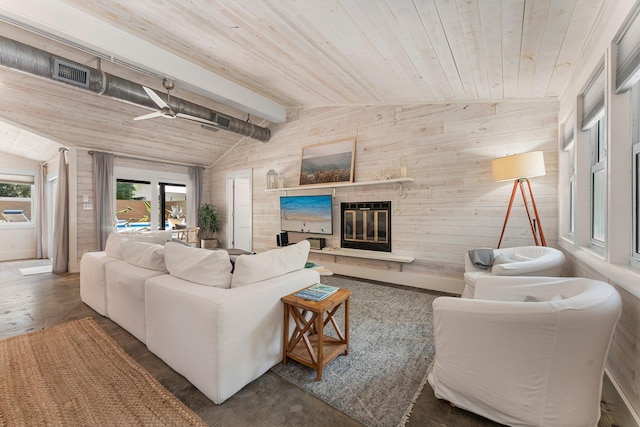 81 Canal St, Santa Rosa Beach, FL 32459 - living area featuring wooden walls, ceiling fan, wooden ceiling, and a glass covered fireplace