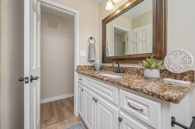 6060 Bud Moulton Rd, Crestview, FL 32536 - bathroom with vanity and wood finished floors